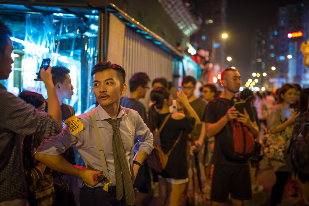 A police detective among the protesters