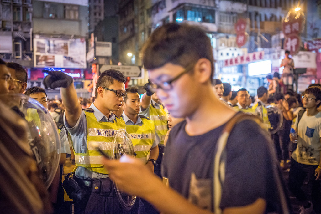 Police officers helping passerby